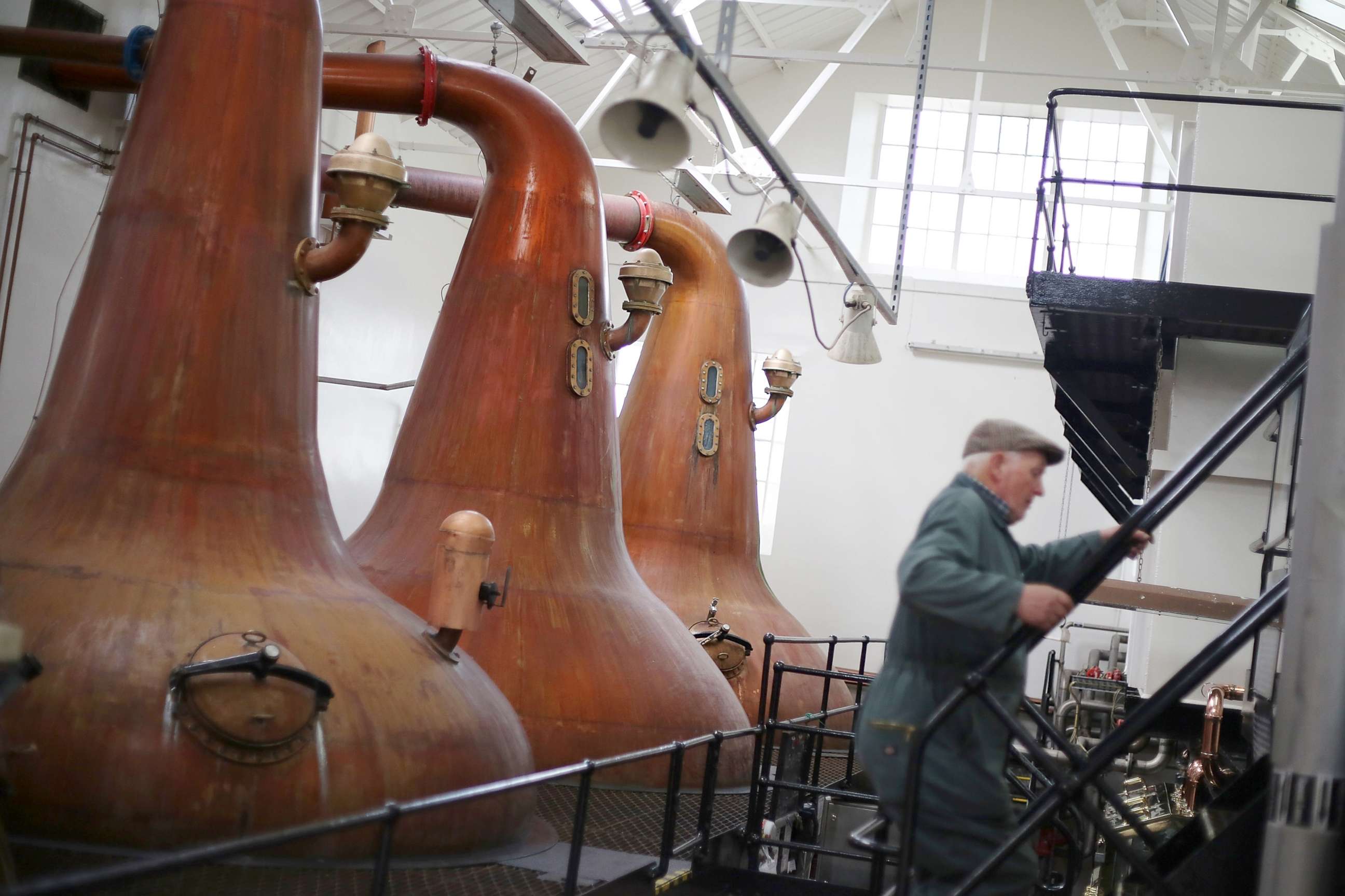 PHOTO: In this file photo, Dave Reid in the 'still room', where the spirit is distilled, of Highland Park whisky distillery, the most northerly distillery in Scotland, May 30, 2014 in Kirkwall, Scotland.