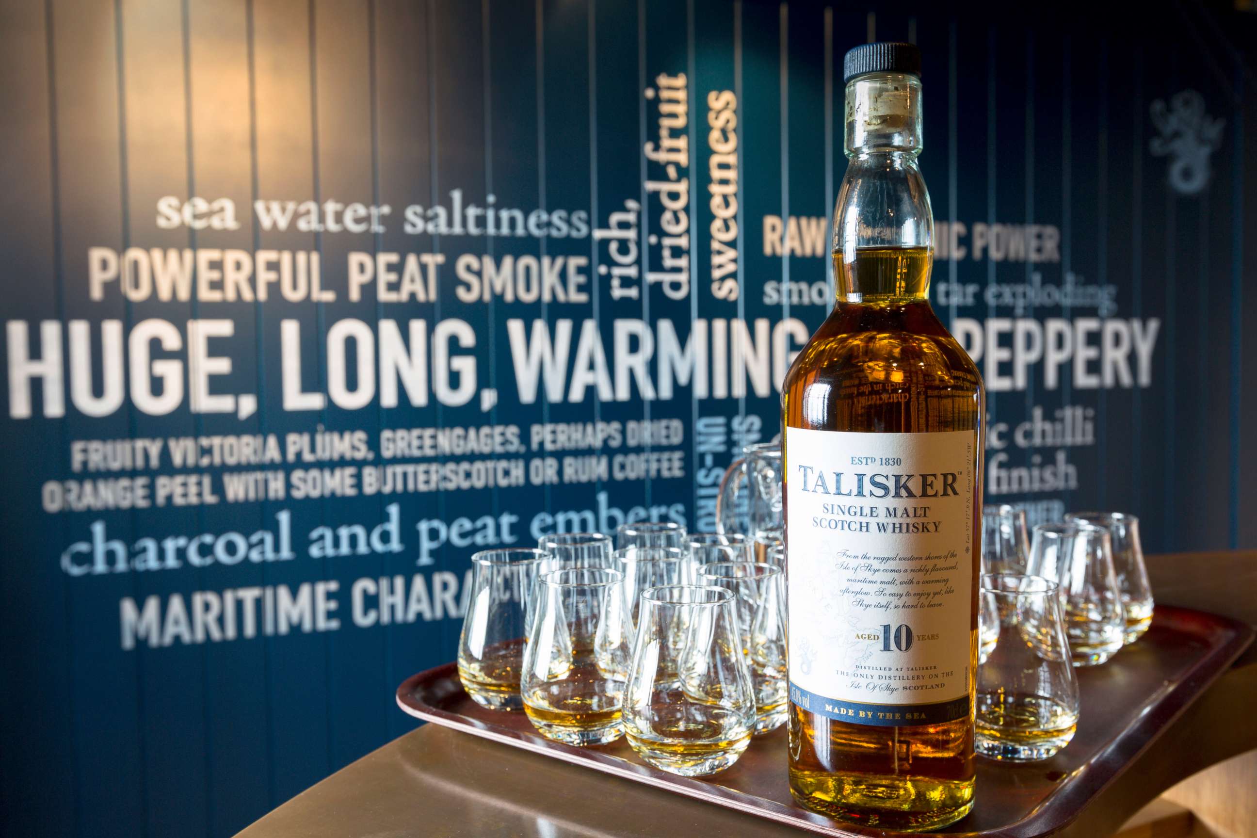 PHOTO: 75cl bottle of 10 year old Talisker single malt Scotch Whiskey and dram glasses for tasting (dramming) as part of the visitors tour at the Distillery in Carbost on Isle of Skye, Scotland, in this file photo dated June 2014.