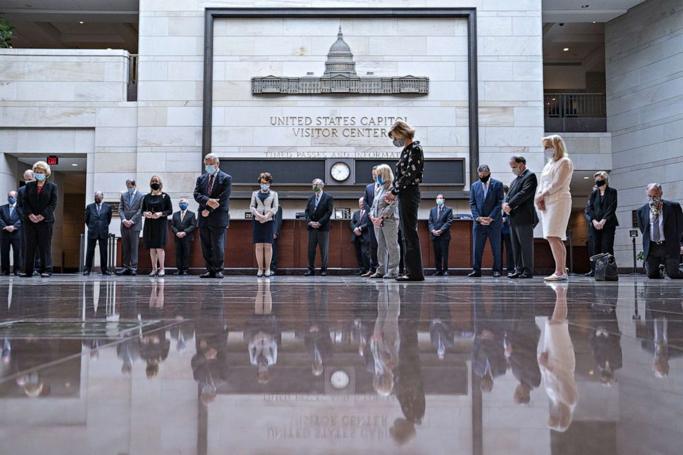 PHOTO: Senate Democrats participate in a moment of silence to honor George Floyd and the Black Lives Matter movement in Emancipation Hall of the U.S. Capitol, June 4, 2020, in Washington.