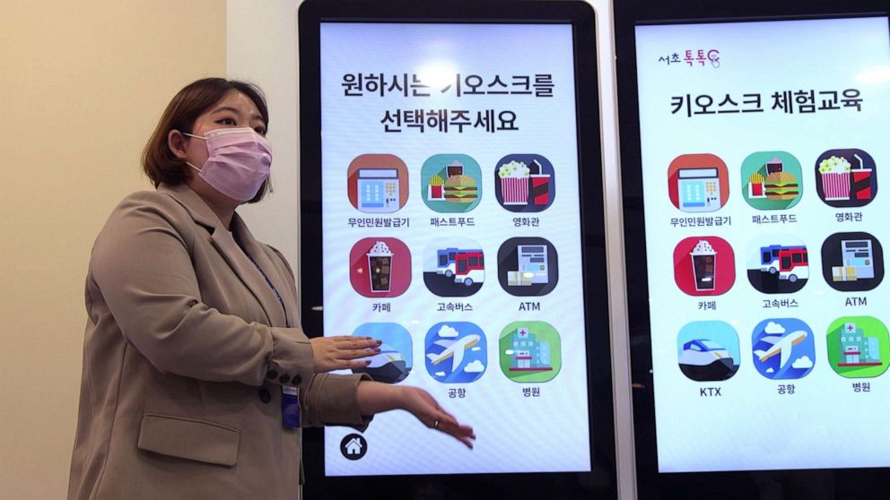 PHOTO: An instructor shows the educational kiosk at the welfare center which provides nine different scenarios to practice real-life simulations, in Seoul, South Korea, Jan. 13, 2022.