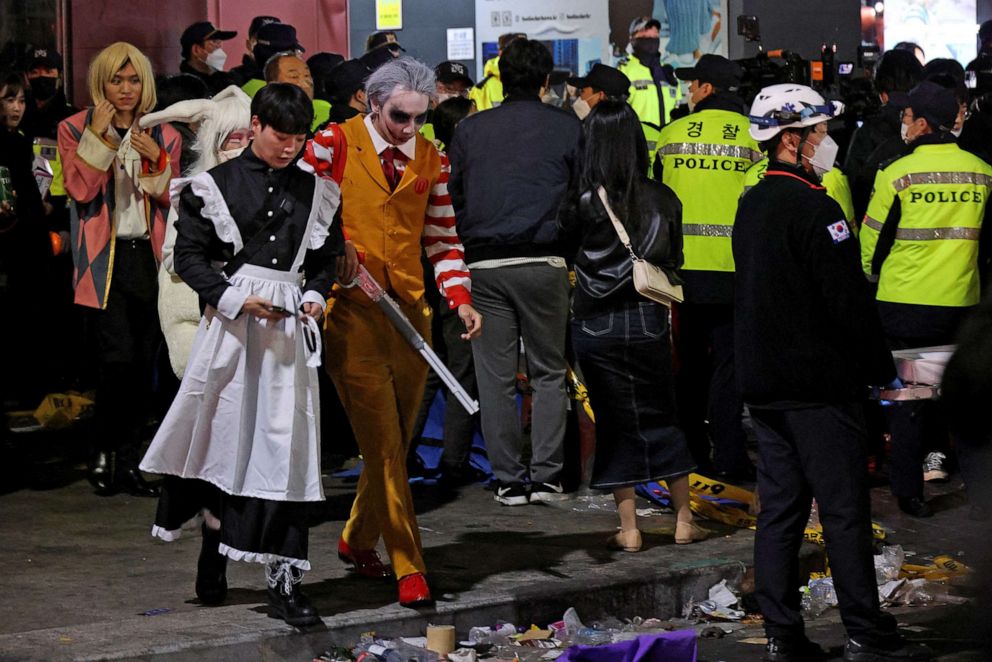 Photo: South Korea;  October 30  2022,  A party leaves the scene of a Halloween party in Seoul that left several people dead and injured.