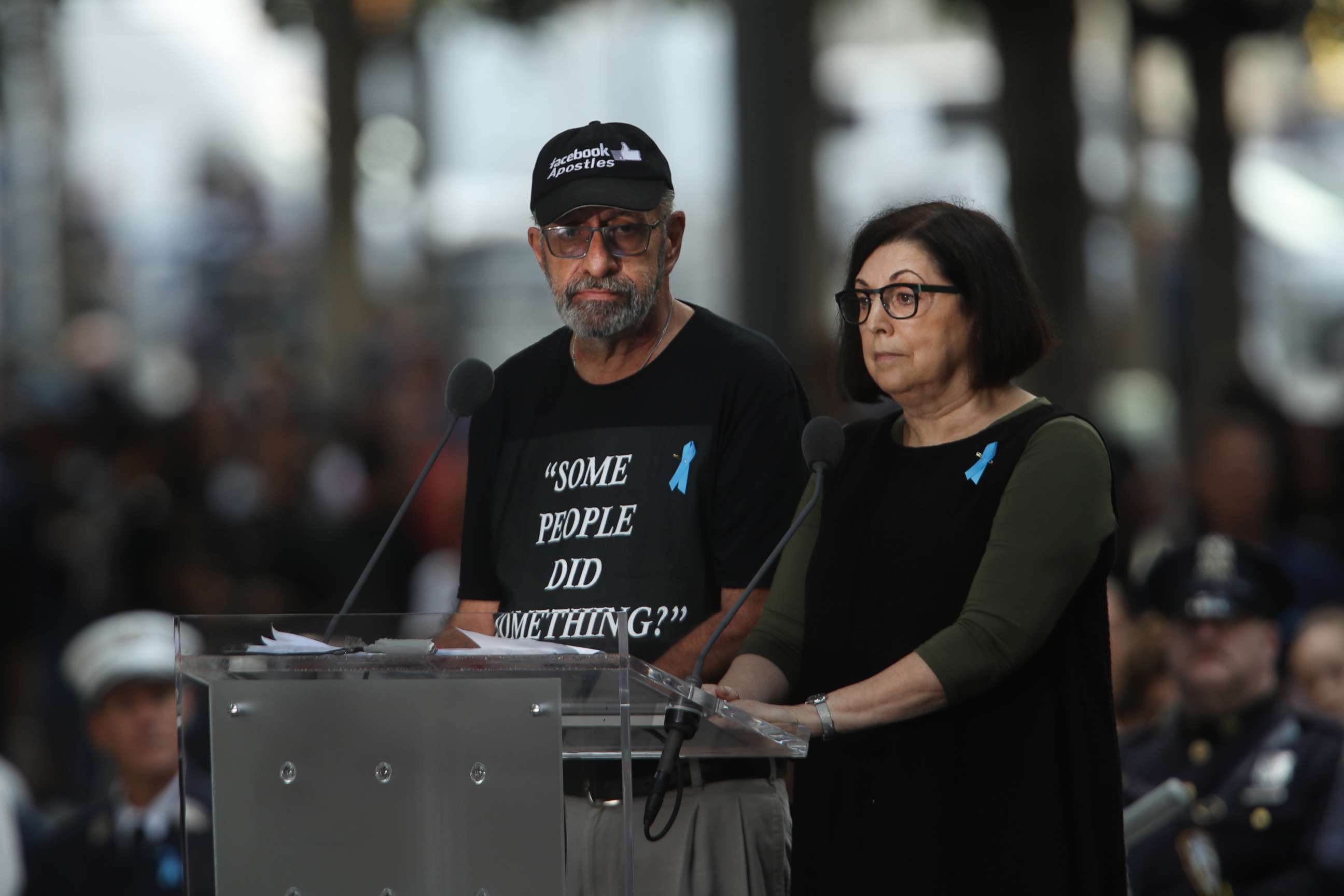 PHOTO: Nicholas Haros, who lost his mother Frances in the September 11, 2001 terrorist attacks, reads names at the National September 11 Memorial, Sept. 11, 2019, in New York City.