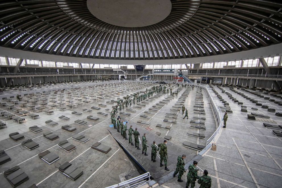 PHOTO: Serbian military sets up the beds inside Hall 1 of the Belgrade Fair to accommodate people with mild symptoms of coronavirus disease (COVID-19) in Belgrade, Serbia, March 24, 2020.