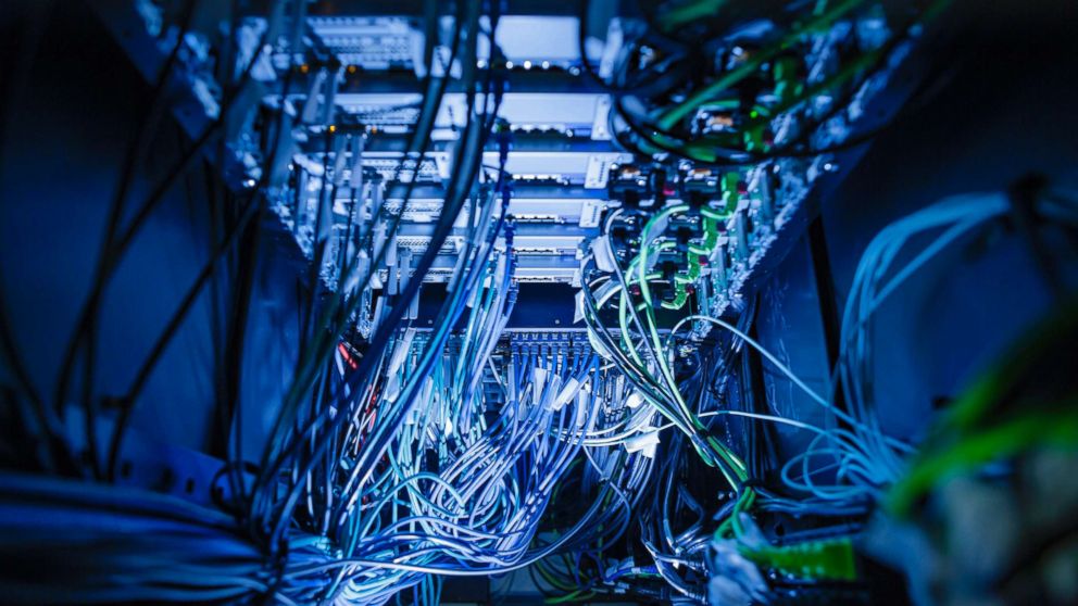 Cables and LED lights in a server center in Berlin, Germany, Jan. 12, 2018. 