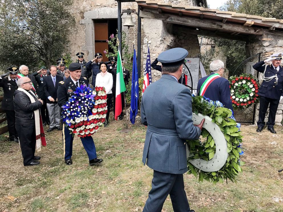 PHOTO: Local dignitaries, international residents and military authorities at the commemorative ceremony at Montebuono, Italy.