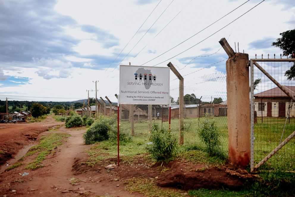 PHOTO: A sign advertising the Serving His Children nutrition unit at the Kigandalo Health Center IV, Mayuge district, Uganda, May 2018.