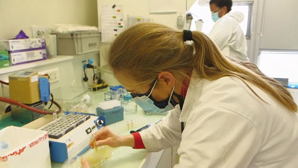 PHOTO: Scientists test water samples.