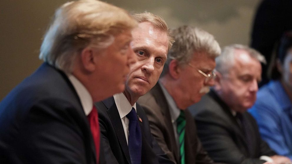 PHOTO: Acting Defense Secretary Patrick Shanahan (2nd L) listens to President Donald Trump during a bilateral meeting with NATO Secretary General Jens Stoltenberg in the Cabinet Room at the White House, April 2, 2019.