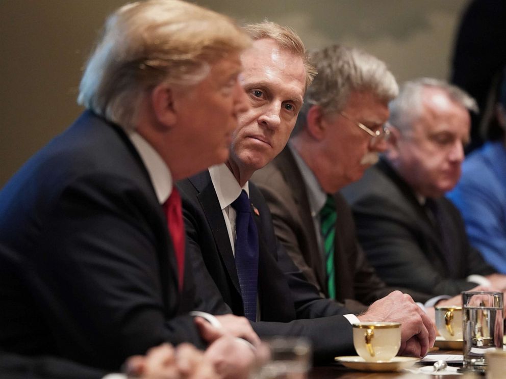 PHOTO: Acting Defense Secretary Patrick Shanahan (2nd L) listens to President Donald Trump during a bilateral meeting with NATO Secretary General Jens Stoltenberg in the Cabinet Room at the White House, April 2, 2019.