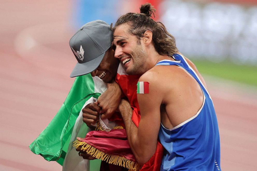PHOTO: Mutaz Essa Barshim of Qatar and Gianmarco Tamberi of Italy celebrate after winning gold medals on Aug. 1, 2021 in Tokyo.