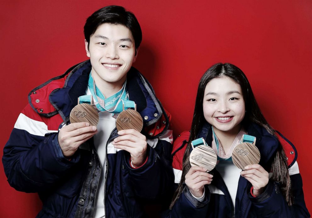 PHOTO: American figure skaters and siblings Maia Shibutani and older brother Alex Shibutani pose for a portrait with their bronze medals, one for the team event and one for the ice dance event, Feb. 20, 2018, in Gangneung, South Korea. 