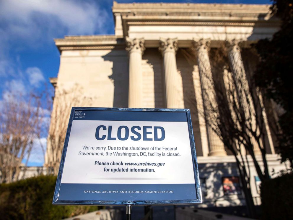   PHOTO: A sign announces the closure of the National Archives building in Washington, DC, December 22, 2018. 