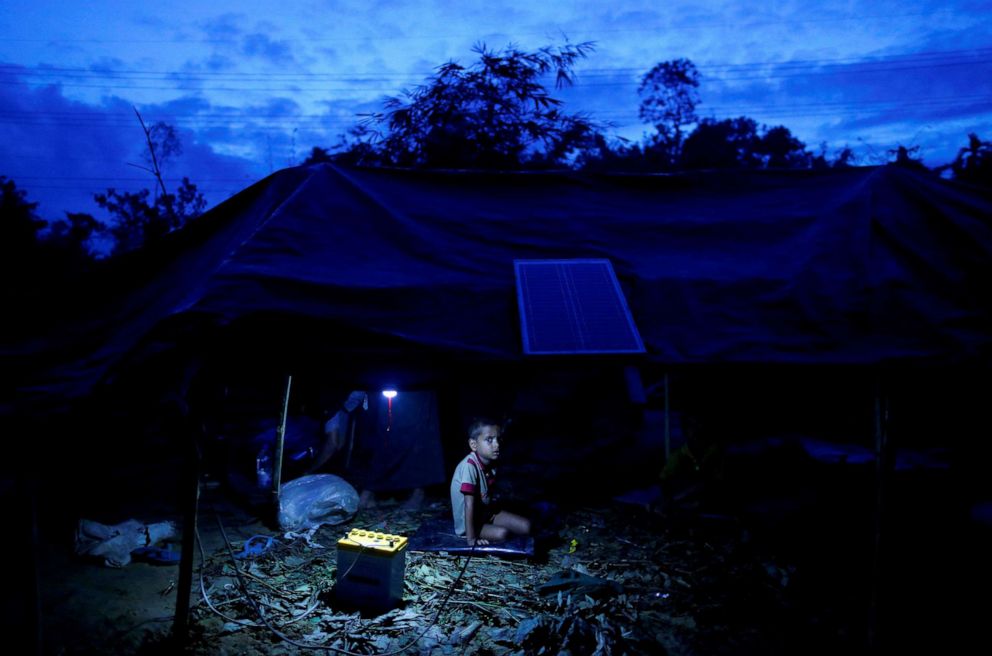 PHOTO: A Rohingya refugee boy sits inside a temporary shelter near Balukhali in Cox's Bazar, Bangladesh, Sept. 12, 2017.