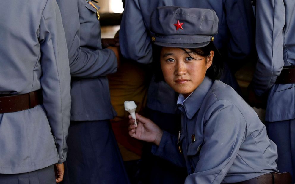 PHOTO: A soldier eats ice cream during a visit to a zoo in Pyongyang, North Korea, Sept. 12, 2018.