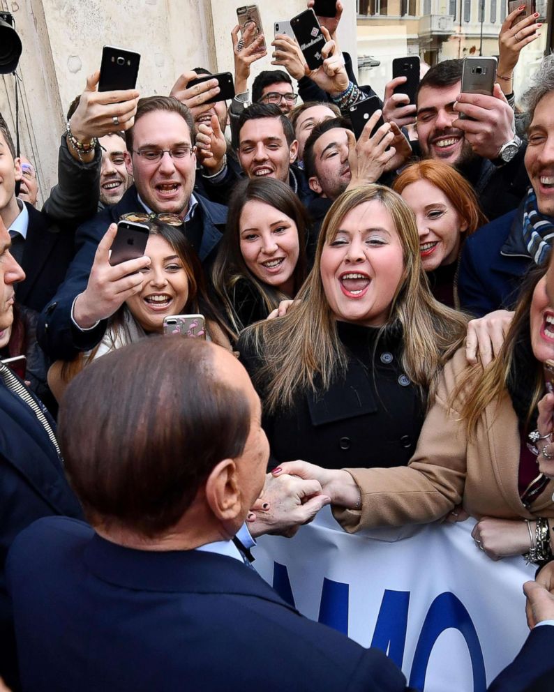 PHOTO: Former Italian Premier Silvio Berlusconi is cheered by followers prior to a meeting with European People's Party President Manfred Weber, in Rome, Feb. 21, 2018.