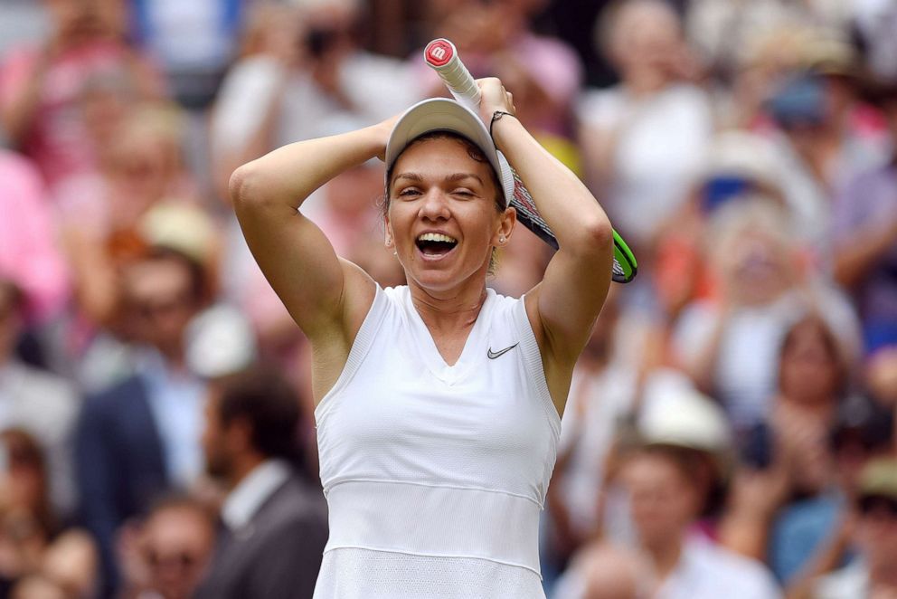 PHOTO: Simona Halep of Romania celebrates championship point in her Ladies' Singles final against Serena Williams of the U.S. during Day twelve of The Wimbledon Championships on July 13, 2019, in London.