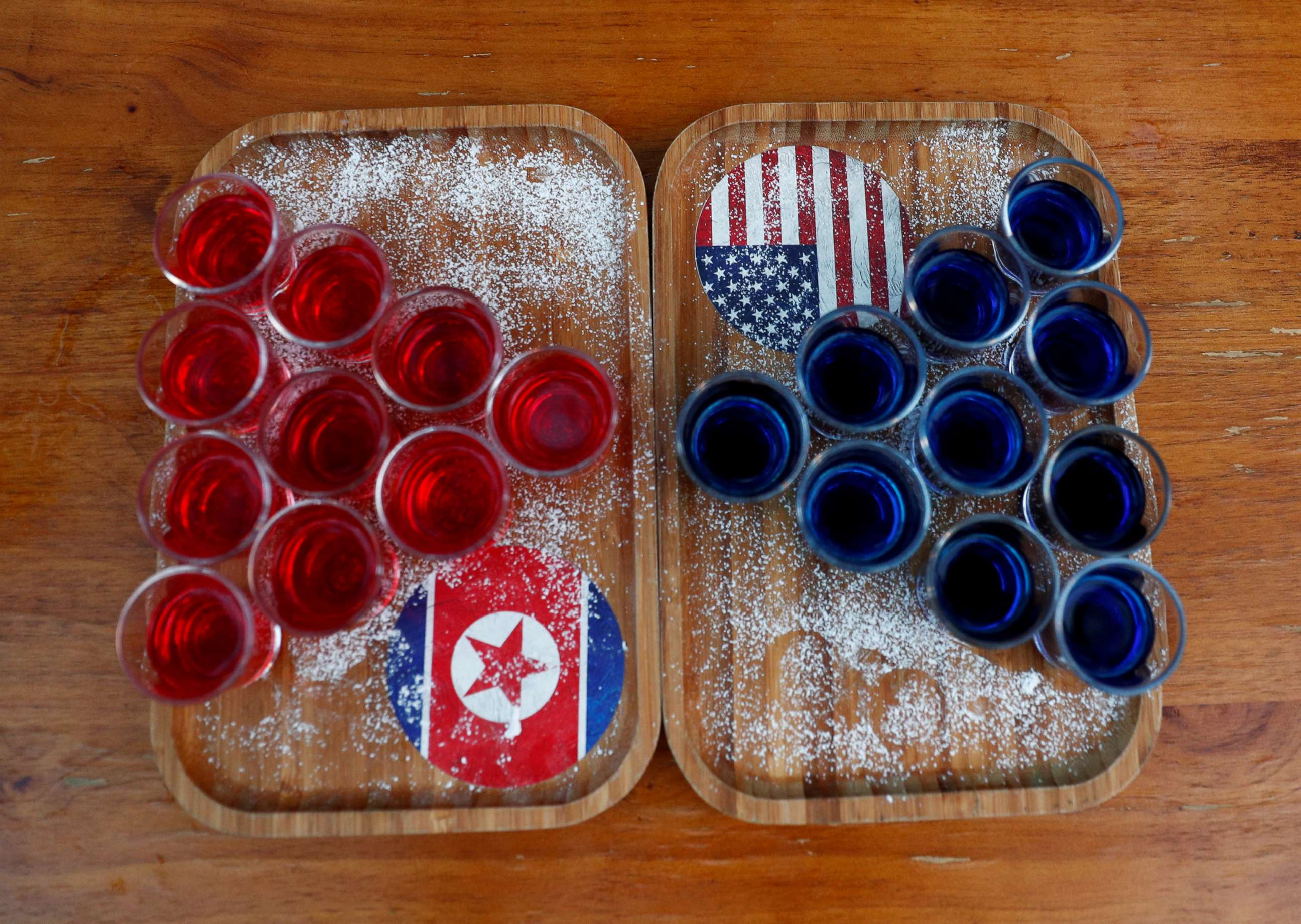 PHOTO: Special red and blue shots offered at Escobar bar to mark the summit meeting between U.S. President Donald Trump and North Korean leader Kim Jong Un, are displayed on a table in Singapore, June 4, 2018.