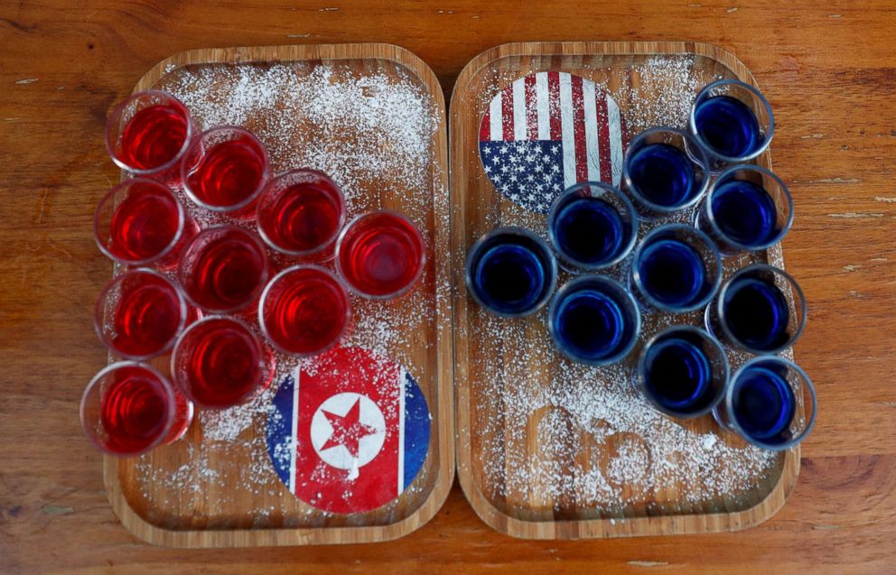 PHOTO: Special red and blue shots offered at Escobar bar to mark the summit meeting between U.S. President Donald Trump and North Korean leader Kim Jong Un, are displayed on a table in Singapore, June 4, 2018.