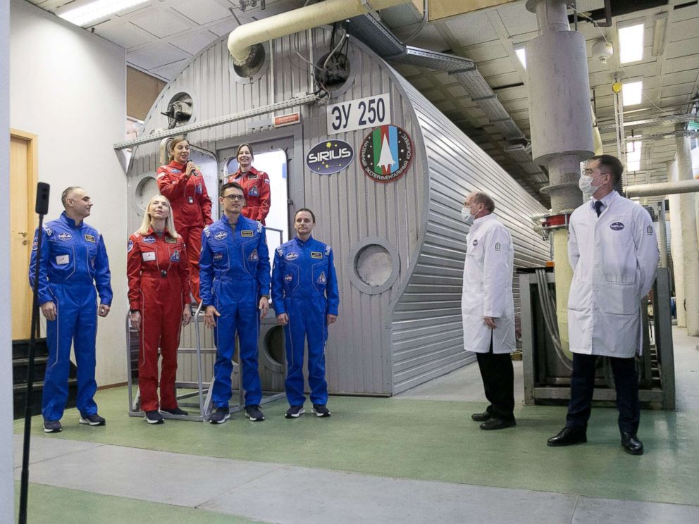 PHOTO: SIRIUS-19 participants stand near the home of the Institute of Biomedical Problems of Moscows where they will spend the next four months indoors.