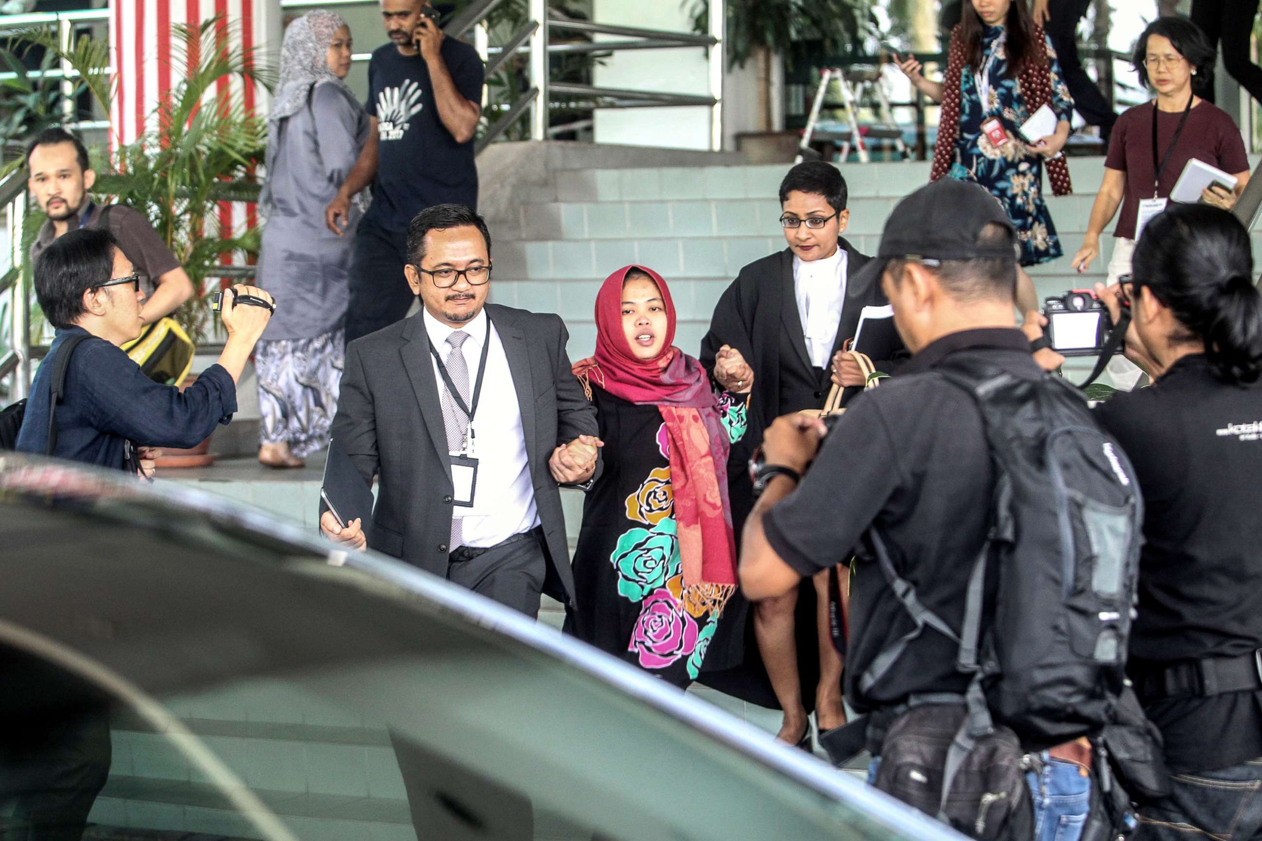 PHOTO: Indonesian Siti Aisyah (center) leaves the Shah Alam High Court in Malaysia, March 11, 2019.