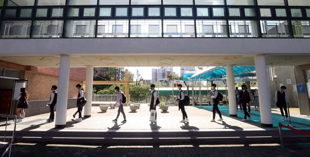 PHOTO: Senior students maintain a social distance as they arrival at Hamwol High School in Ulsan, South Korea, May 20, 2020.