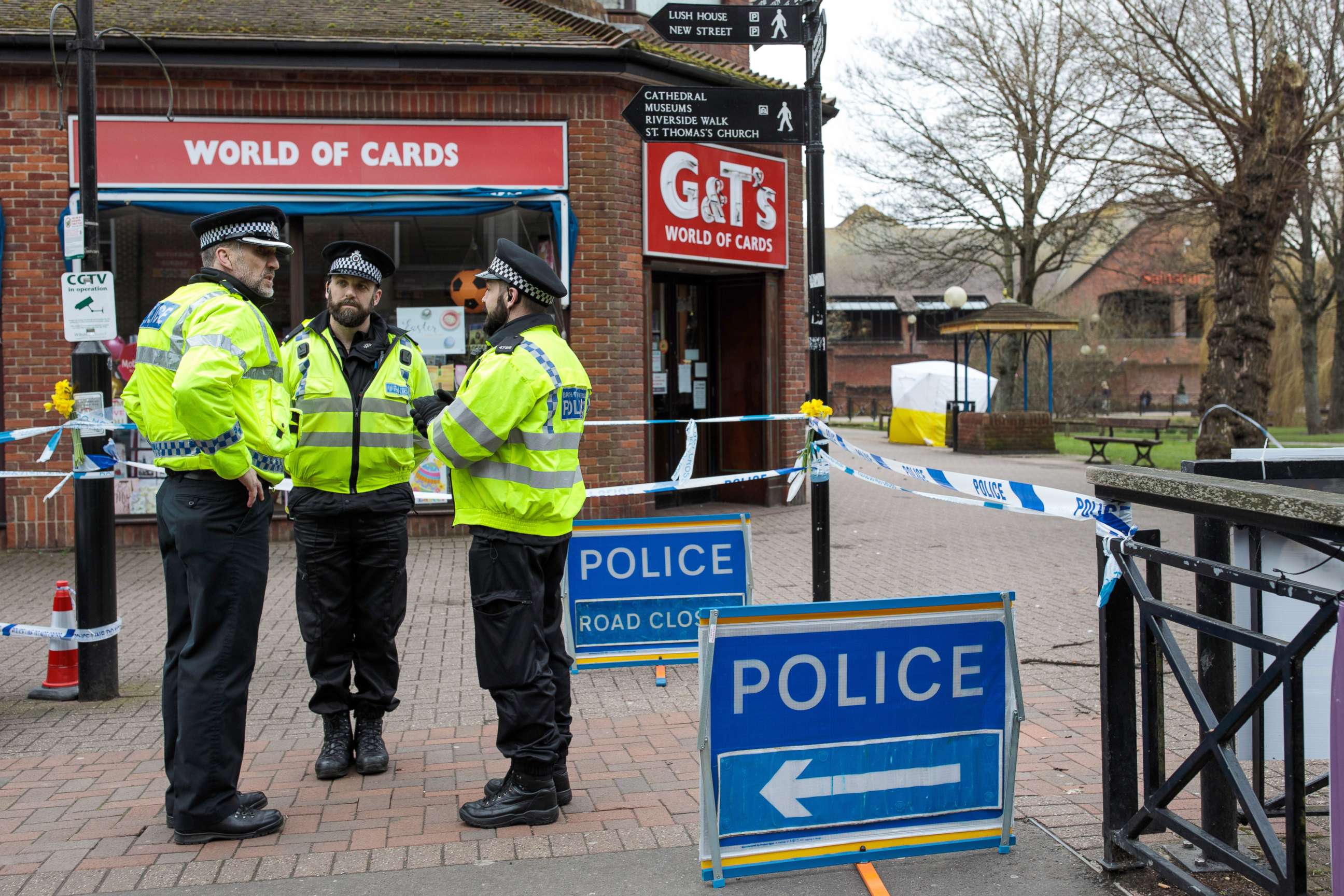 PHOTO: Police officers stand by the cordon as a forensics tent remains over a bench at the scene connected to the Sergei Skripal nerve agent attack as investigations continue into the poisoning of Sergei Skripal, March 13, 2018, in Salisbury, England. 