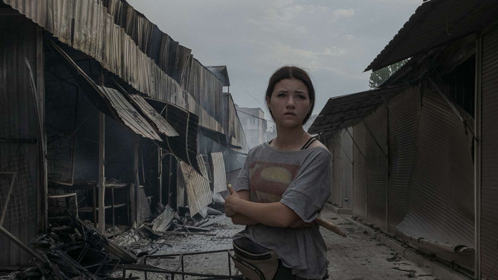 PHOTO: A young resident surveys the damage caused by rocket strikes on the main market in Sloviansk, Ukraine, July 5, 2022.