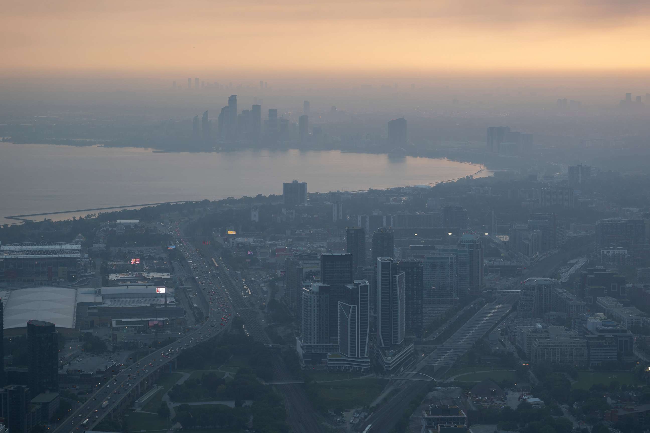 PHOTO: Smoke from wildfires in the provinces of Quebec and Nova Scotia is seen on June 28, 2023 in Toronto.