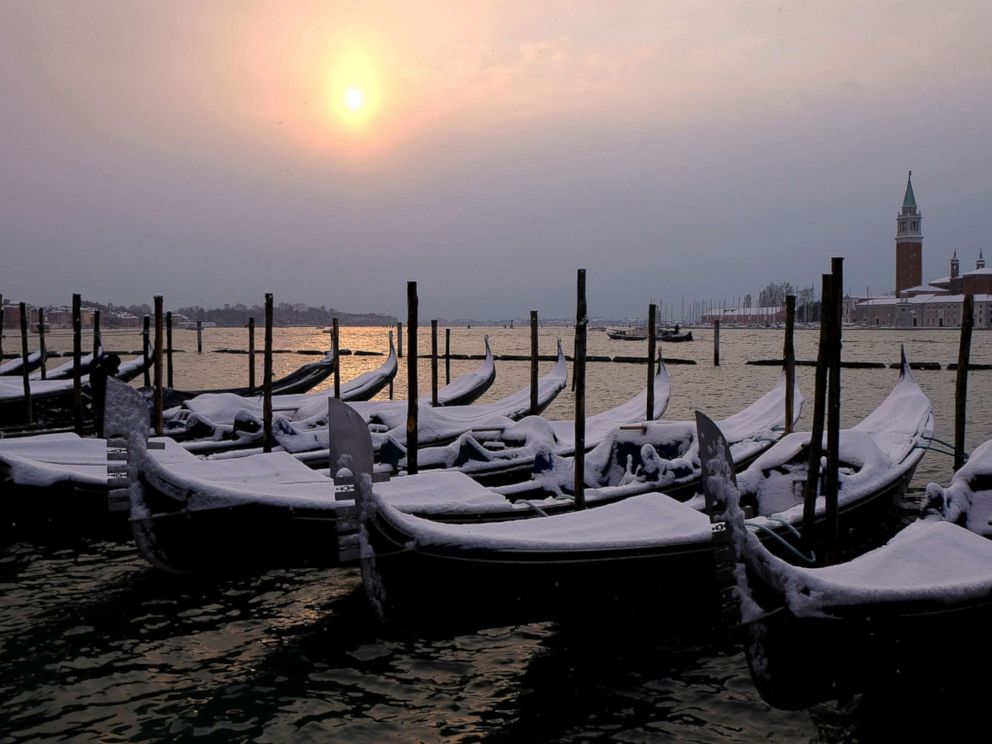 PHOTO: Snow covered gondolas are seen near St.Mark square in Venice lagoon, Italy, Feb. 28, 2018.