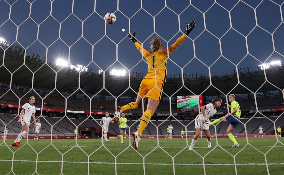 PHOTO: Lina Hurtig of Team Sweden scores their side's third goal past Alyssa Naeher of Team United States during the Women's First Round Group G match between Sweden and United States during the Tokyo 2020 Olympic Games.
