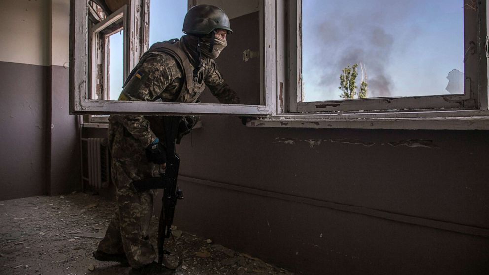 PHOTO: A Ukrainian soldier takes a position during heavy battles at the front line in Severodonetsk, Luhansk region, Ukraine, June 8, 2022.