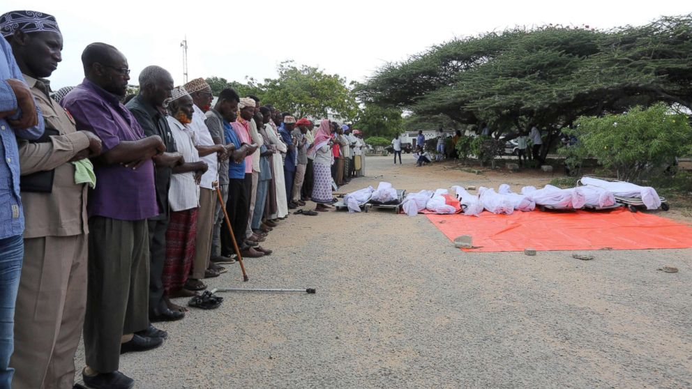 PHOTO: Relatives prepare to pray near the wrapped bodies of people killed in an attack by Somali forces supported by U.S. troops before their burial, in Mogadishu, Somalia, Aug. 31, 2017. 