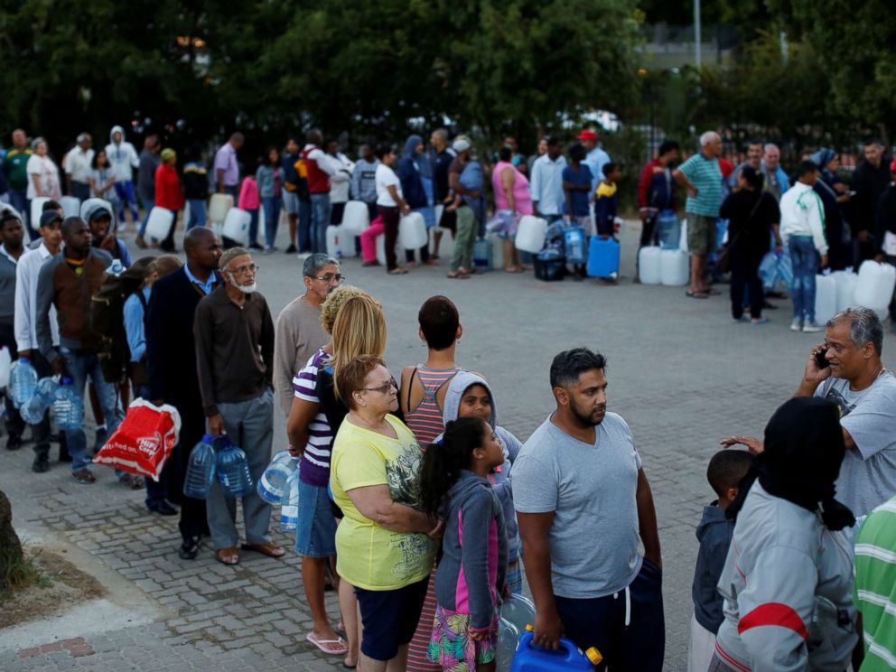 PHOTO: People queue to collect water from a spring in the Newlands suburb of Cape Town, South Africa, Jan. 25, 2018.