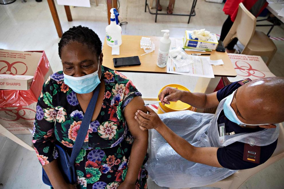 PHOTO: A healthcare worker receives a dose of the Johnson & Johnson vaccine against COVID-19 as South Africa proceeds with its inoculation campaign at the Klerksdorp Hospital on Feb. 18, 2021.