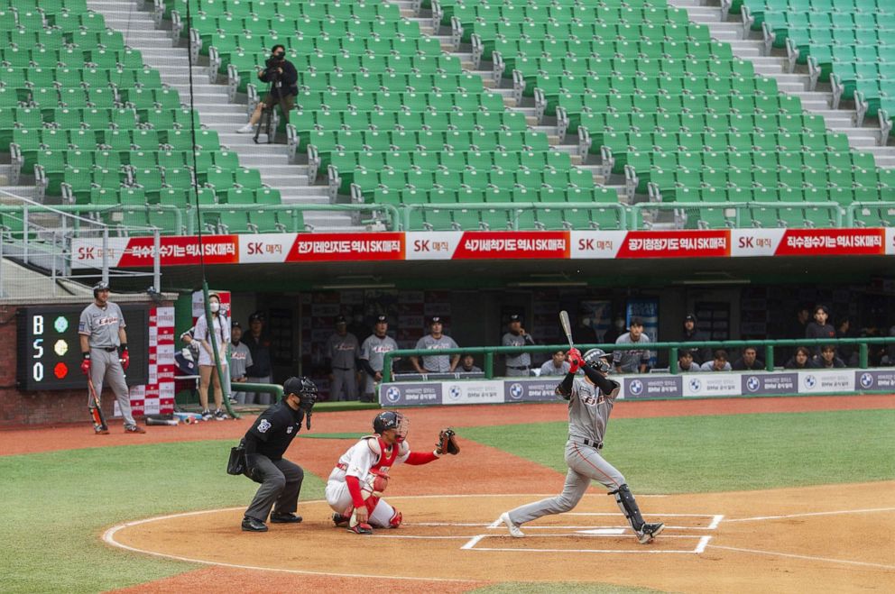 PHOTO: Players in action during a baseball game between SK Wyverns and Hanwha Eagles at SK Wyverns club's Happy Dream Ballpark without spectators due to the novel coronavirus (COVID-19) pandemic on May 7, 2020 in Incheon, South Korea.