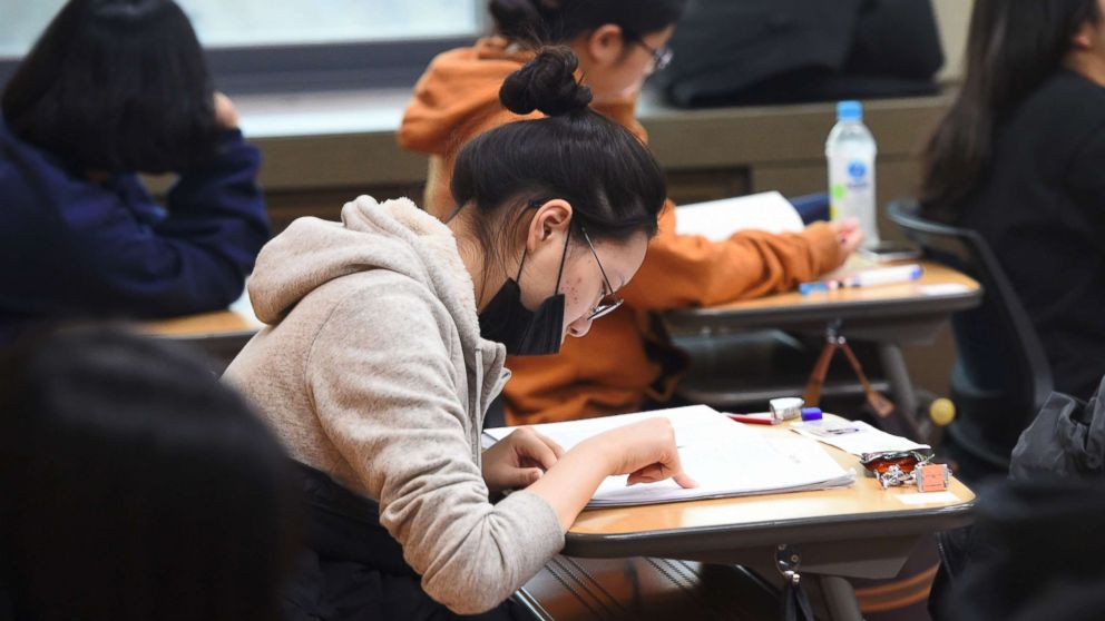 Students prepare to take the annual College Scholastic Ability Test, a standardized exam for college entrance, at a high school in Seoul on Nov. 23, 2017.