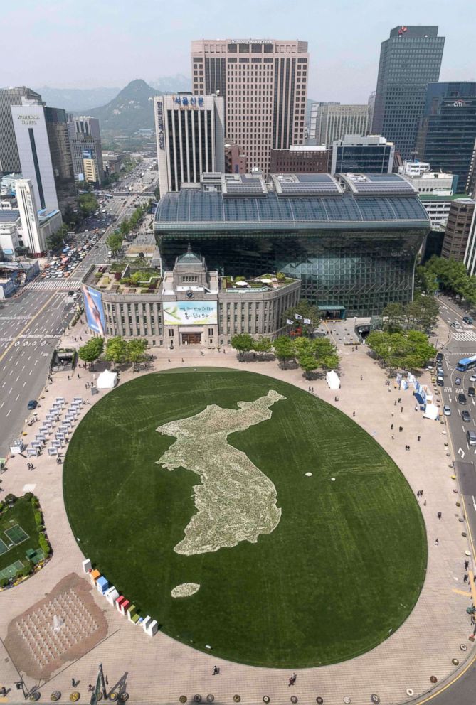 PHOTO: A general view shows a map of the Korean peninsula created using flowers by the Seoul city government to commemorate the upcoming inter-Korean summit, at Seoul city hall plaza, April 26, 2018.