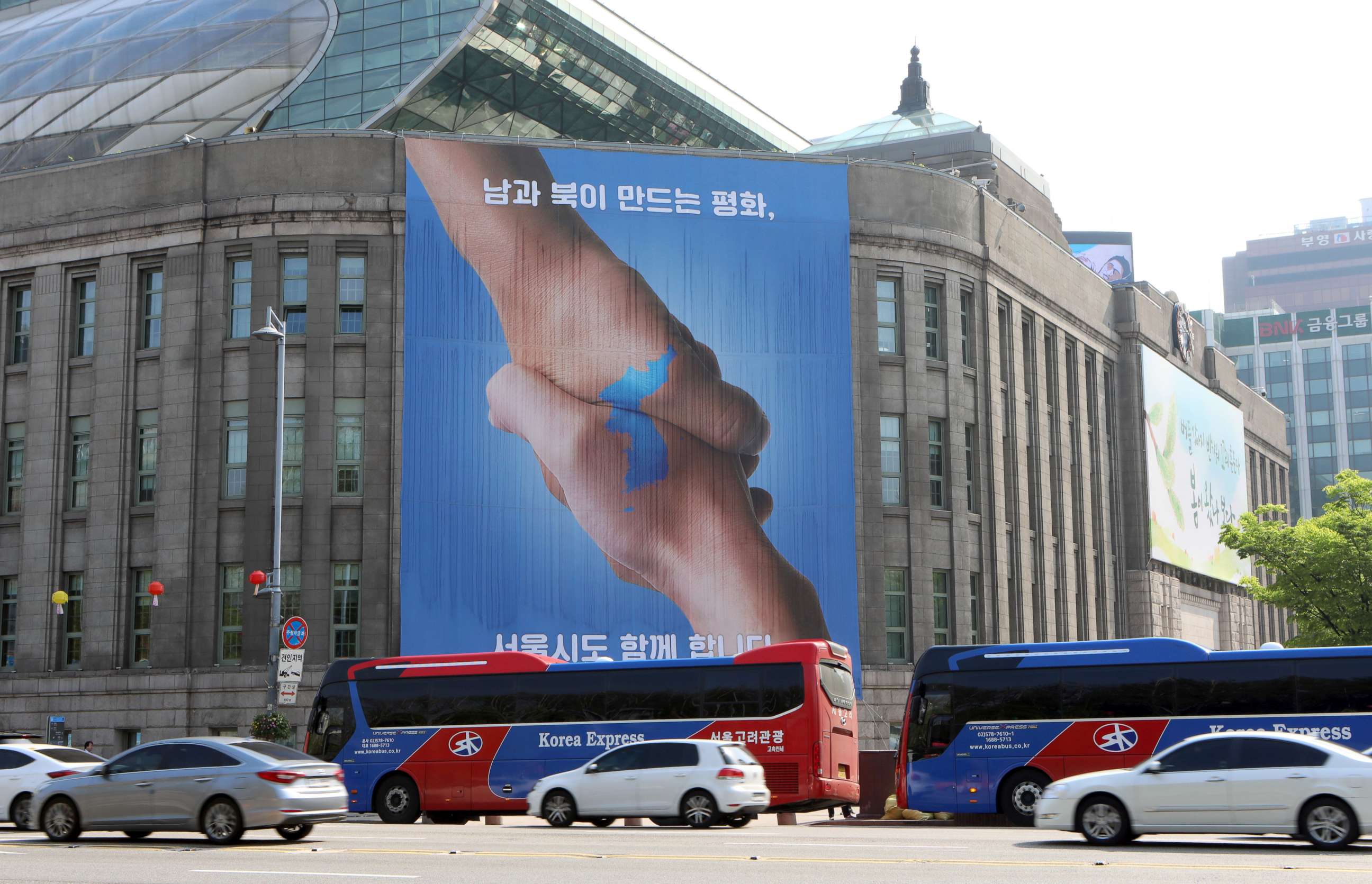 PHOTO: A giant poster about the inter-Korean summit in Seoul, South Korea, April 26, 2018.