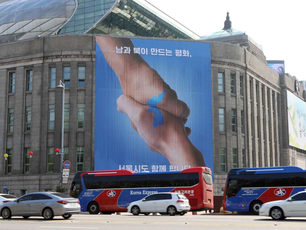 PHOTO: A giant poster about the inter-Korean summit in Seoul, South Korea, April 26, 2018.