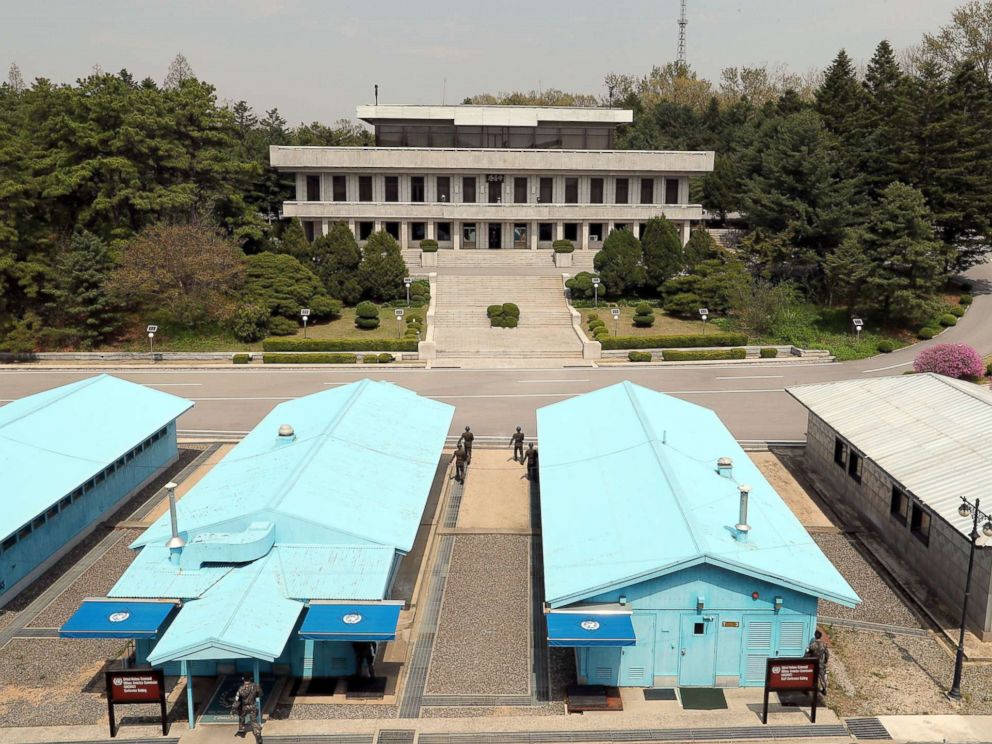 PHOTO: South Korean and North Korean soldiers stand guards at the Joint Security Area (JSA) on the Demilitarized Zone (DMZ) in the border village of Panmunjom in Paju, South Korea, April 26, 2018.