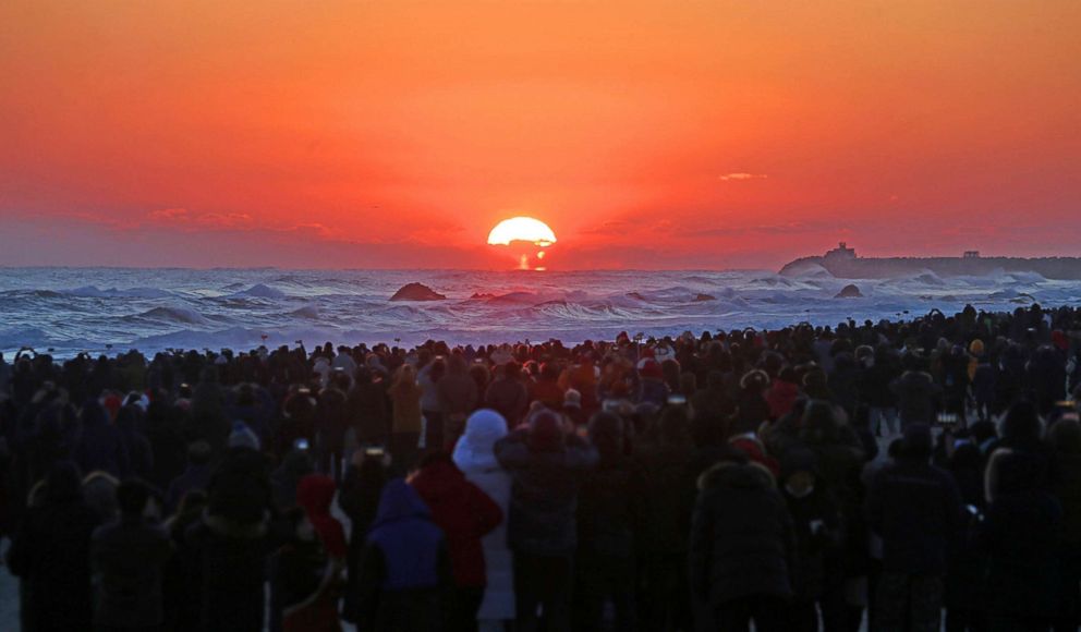 PHOTO: A huge crowd watches the New Year's Day sunrise on Masangsang Beach in Donghae, east of Seoul, South Korea, Jan. 1, 2018.