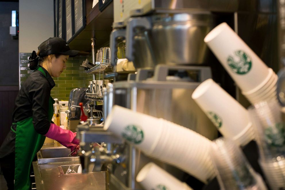 PHOTO: A barista washes at a sink inside a Starbucks Coffee Korea Co. store in Gimpo, South Korea, March 7, 2014.