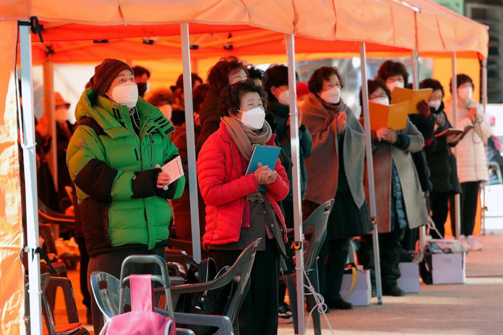 PHOTO: Parents pray during a special service to wish for their children's success in the college entrance exams at the Jogyesa Buddhist temple in Seoul, South Korea, Dec. 3, 2020.