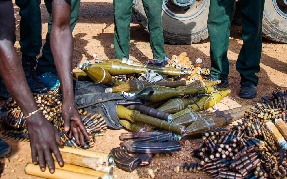 PHOTO: In this file photo taken on April 25, 2016, rebel troops of the Sudan People's Liberation Army in Opposition (SPLA-IO) unload their weapons at their military site in Juba, South Sudan.  