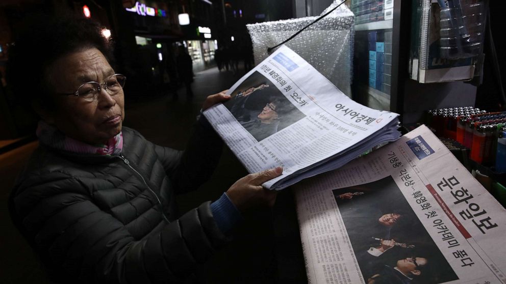  A newsstand vender collects newspapers reporting the South Korean director Bong Joon-ho on February 10, 2020 in Seoul, South Korea. Bong Joon-ho's 'Parasite' became the first non-English language film to win best picture. A newsstand vender collects newspapers reporting the South Korean director Bong Joon-ho on February 10, 2020 in Seoul, South Korea. Bong Joon-ho's 'Parasite' became the first non-English language film to win best picture.Chung Sung-jun/Getty Images