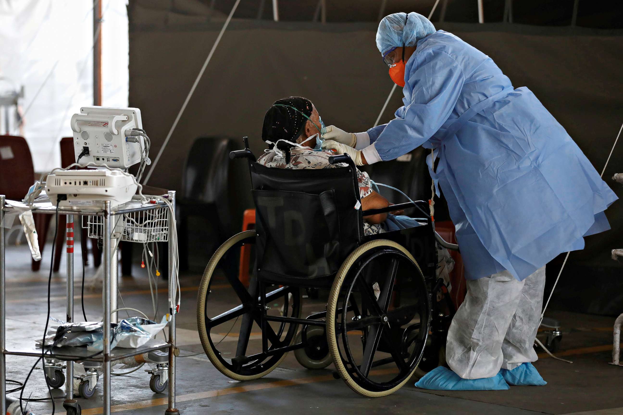 PHOTO: Healthcare workers tend to a patient at a temporary ward set up during the COVID-19 outbreak at Steve Biko Academic Hospital in Pretoria, South Africa, Jan. 19, 2021.