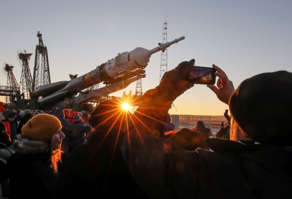 PHOTO: Spectators watch the Soyuz MS-11 spacecraft for the next International Space Station (ISS) crew, c is ready to be set on the launchpad ahead of its upcoming launch, at the Baikonur Cosmodrome, Kazakhstan Dec. 1, 2018. 