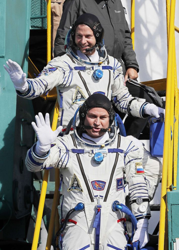 NASA astronaut Nick Hague and Roscosmos cosmonaut Alexey Ovchinin board the Soyuz MS-10 spacecraft prior to the launch at the Russian-leased Baikonur cosmodrome in Kazakhstan on Oct. 11, 2018. 