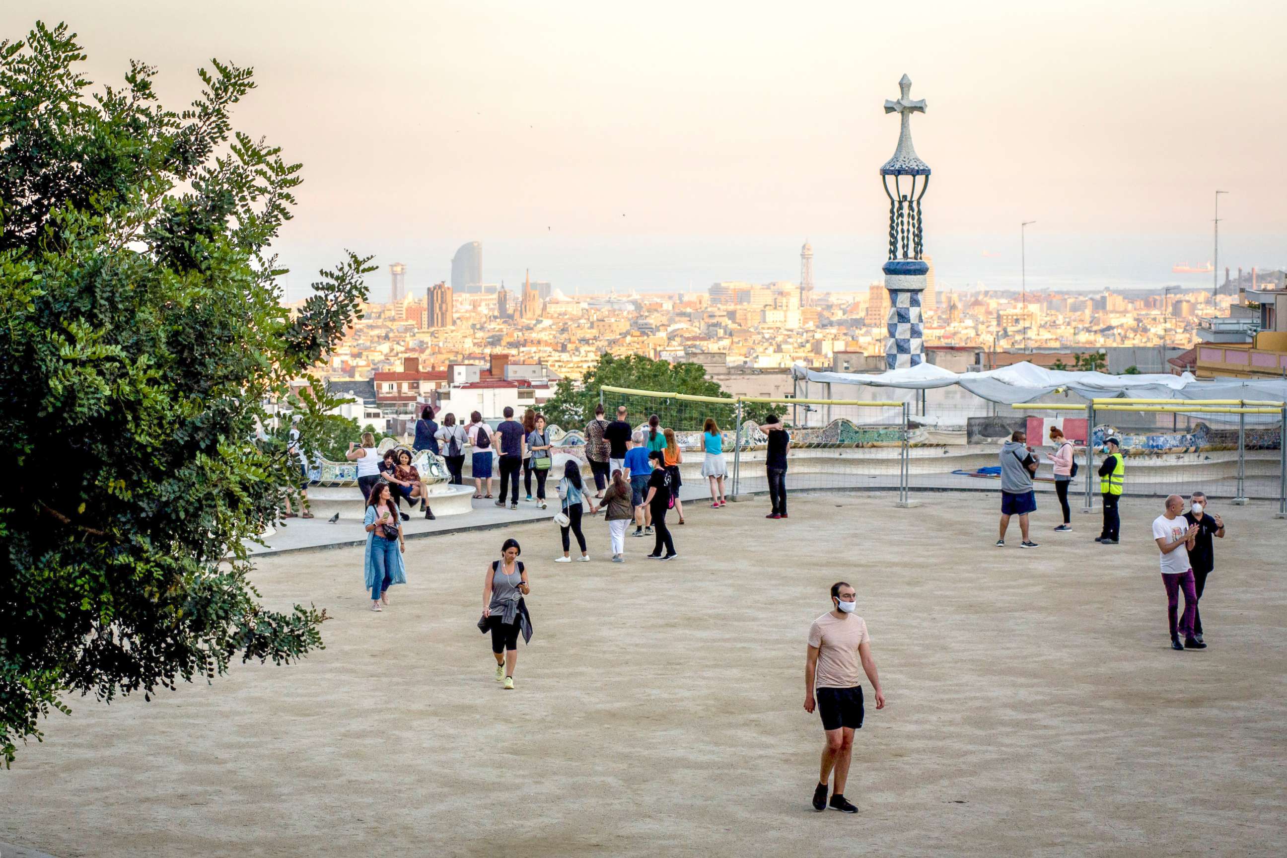 PHOTO: People in Barcelona visit the Guell Park on May 20, 2020.