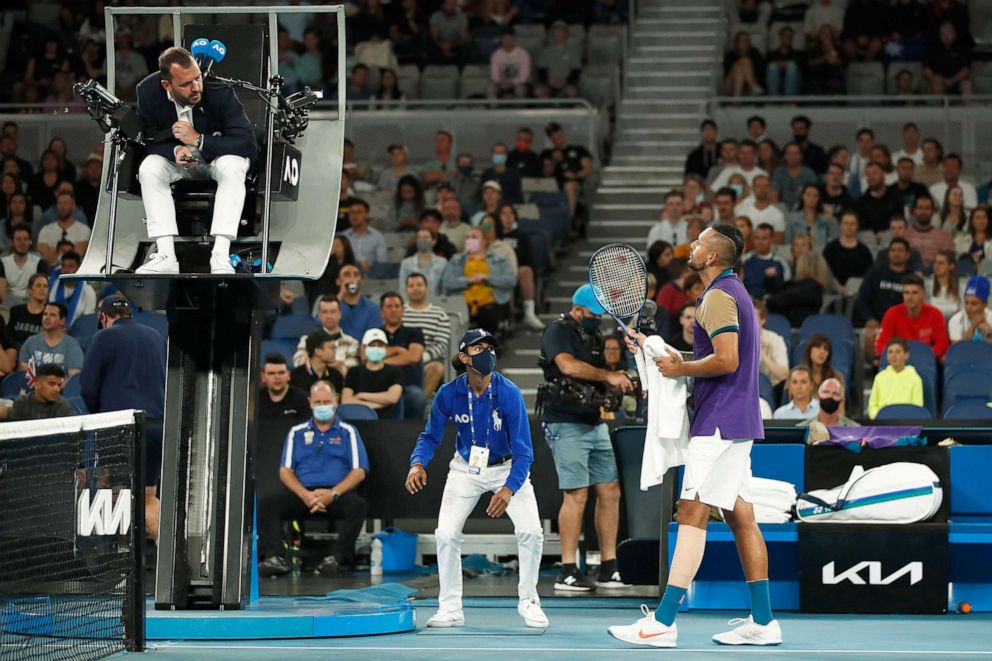 PHOTO: Fans look on as Nick Kyrgios of Australia speaks to the chair umpire in his Men's Singles third round match against Dominic Thiem of Austria during day five of the 2021 Australian Open at Melbourne Park on Feb. 12, 2021 in Melbourne, Australia.